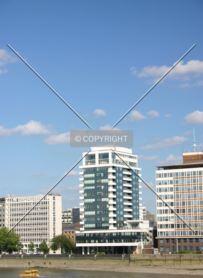 Juxtaposed against surrounding buildings