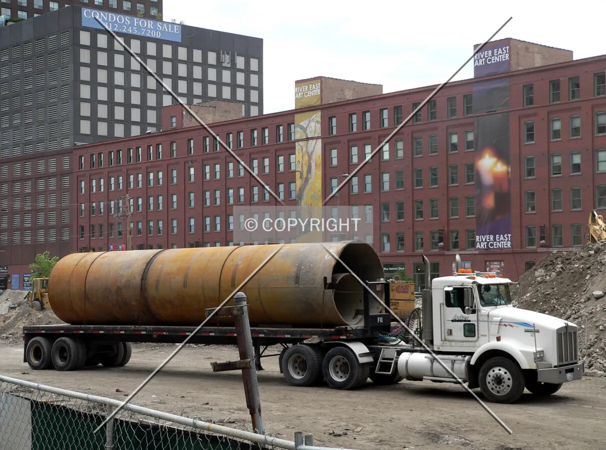 Caisson top on top of a flatbed truck