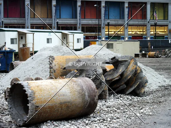 Drill bits and caisson forms; 28 December 2003