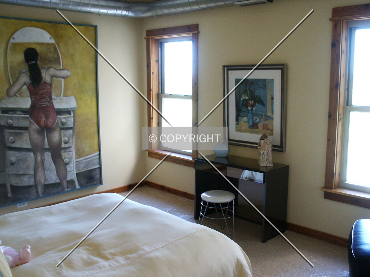A bedroom on the top floor