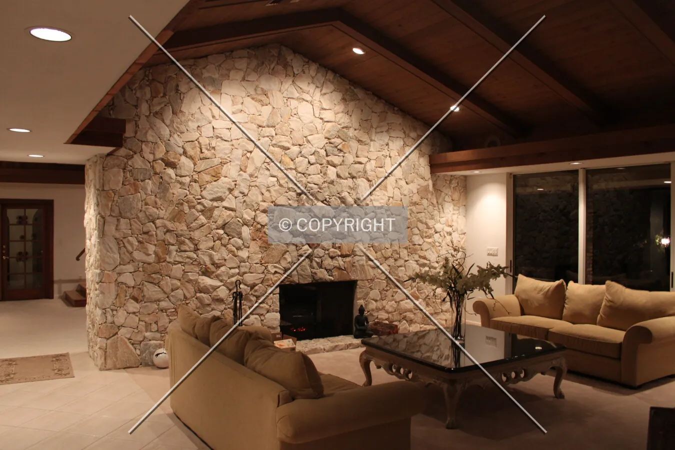 A living room including a fire place