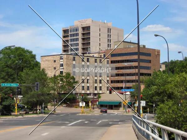 View to the east from the Franklin Avenue Bridge, with Thornton Place Apartments rising behind