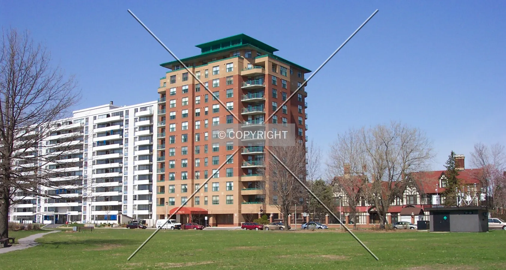 View of the west facade, as seen from MacDonald Gardens Park