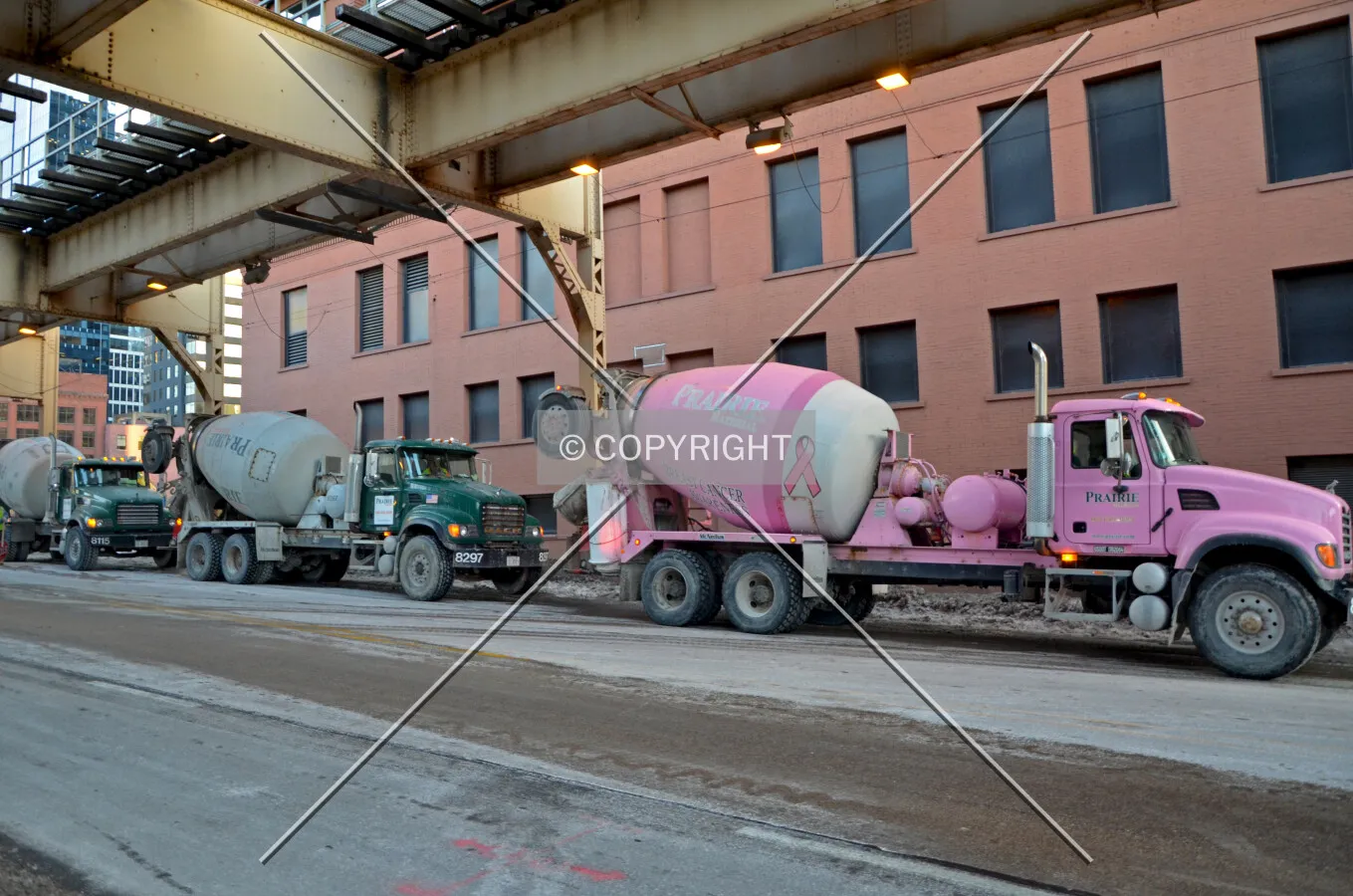 Concrete trucks queued along Lake Street during the foundation mat pour; February 14, 2015.