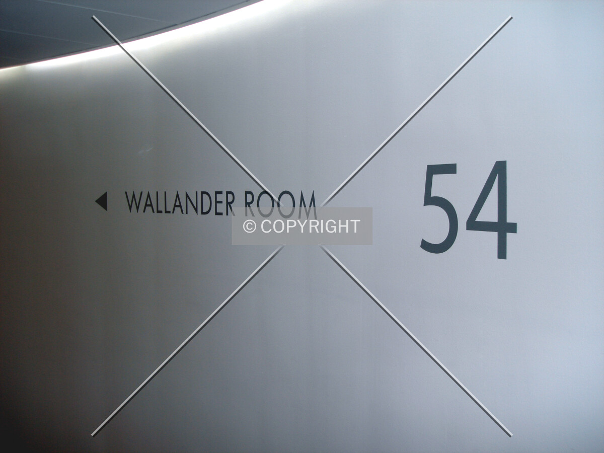 Behind the shear wall in the building's center; here: floor 54