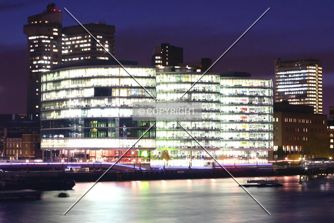 View southwest from Tower Bridge at dusk