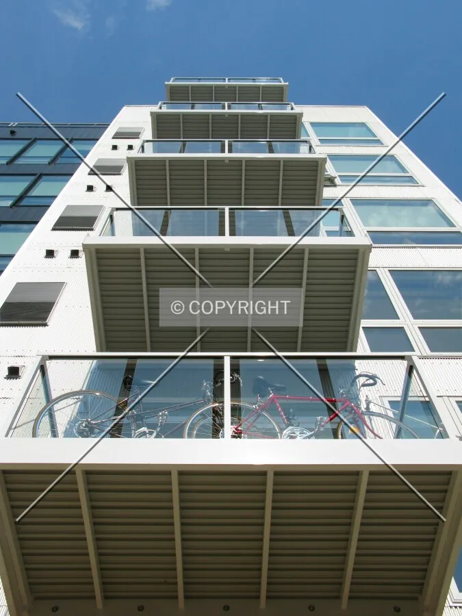 Looking up balconies on the east corner