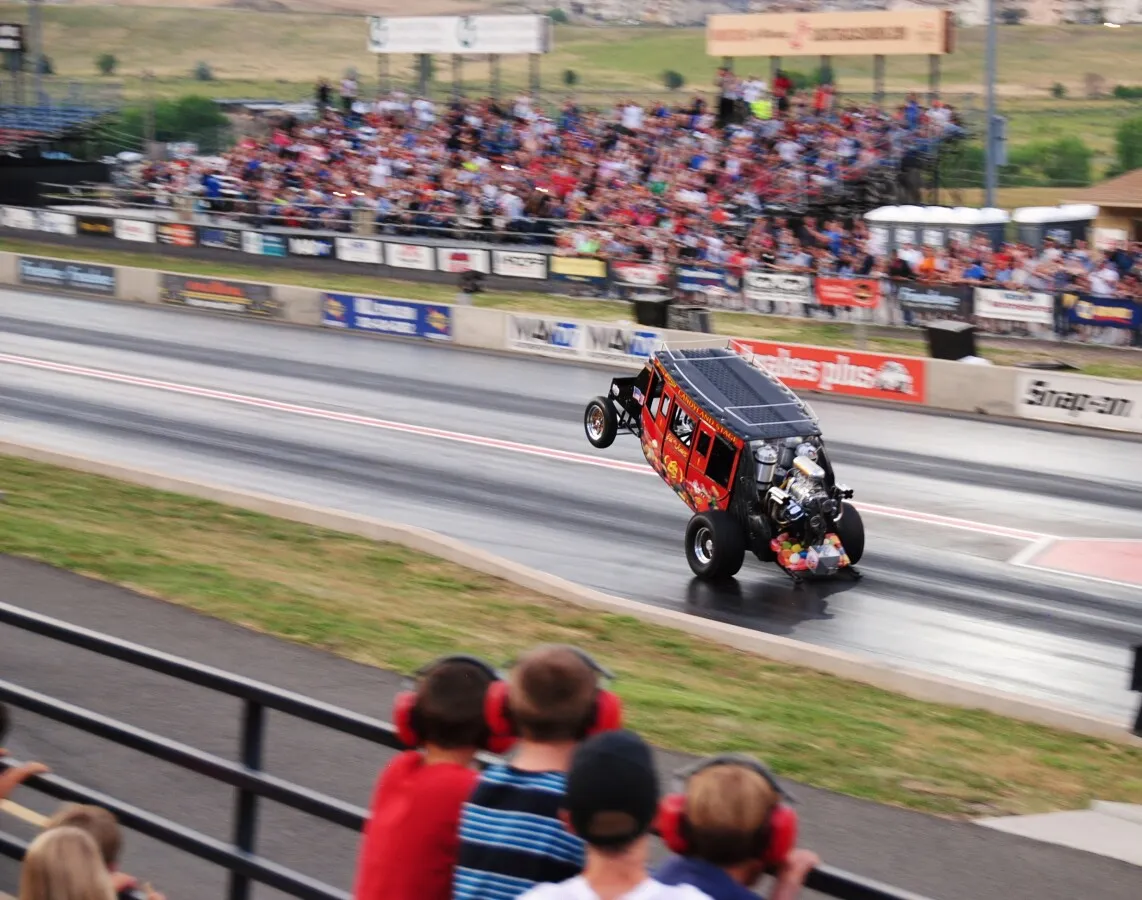 Jelly Belly dragster making a wheelie pass