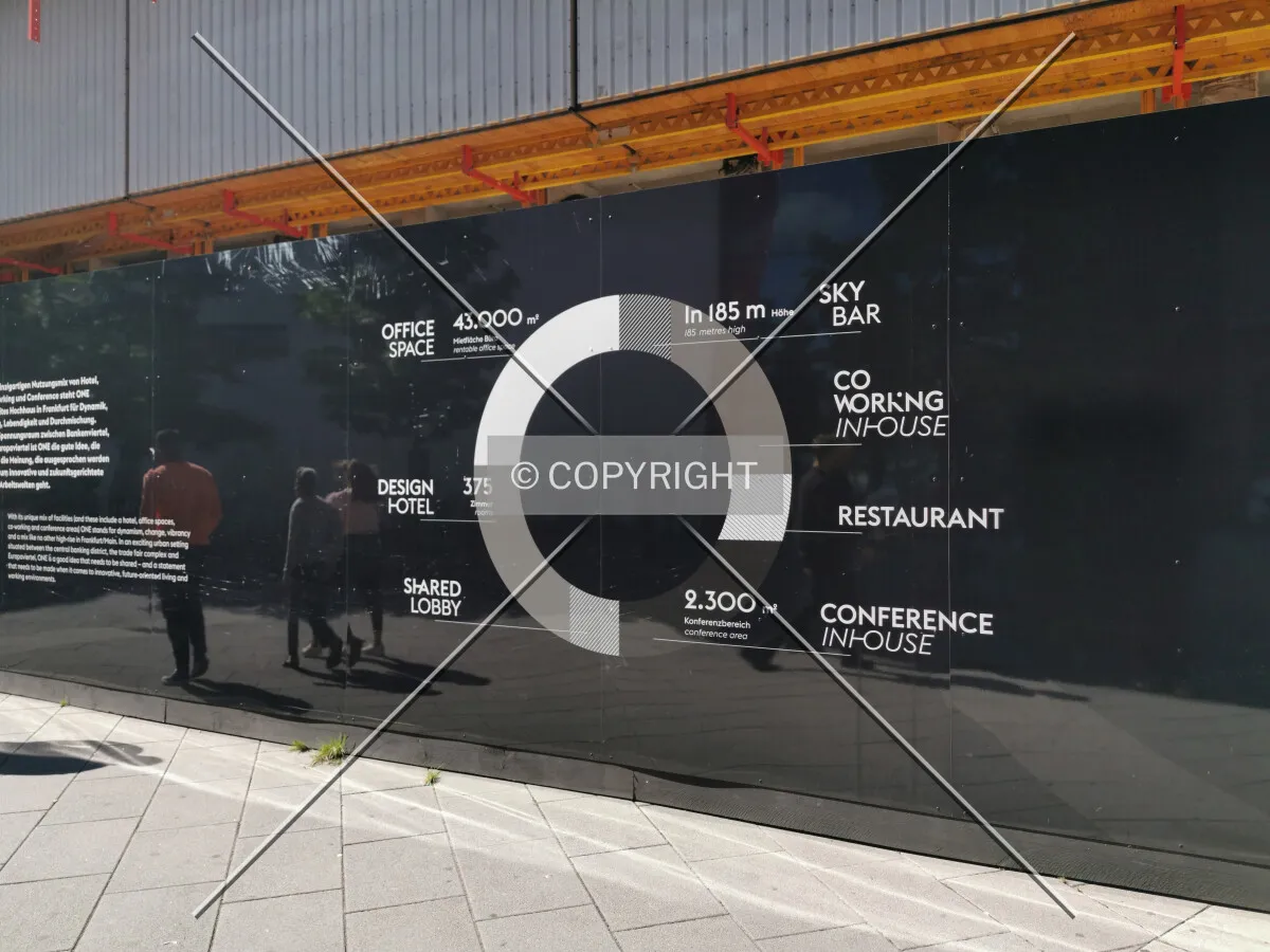 Construction fence showing the distribution of usages of the new skyscraper