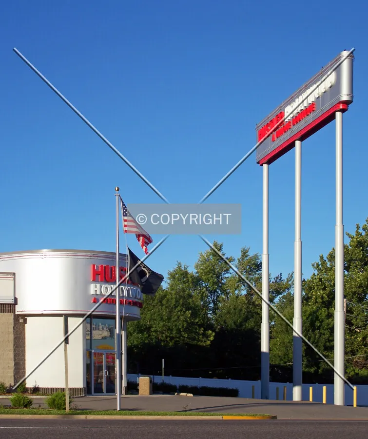 Entrance and sign from the north