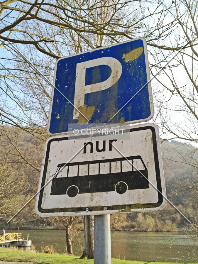 A sign which is indicating that here is bus parking only