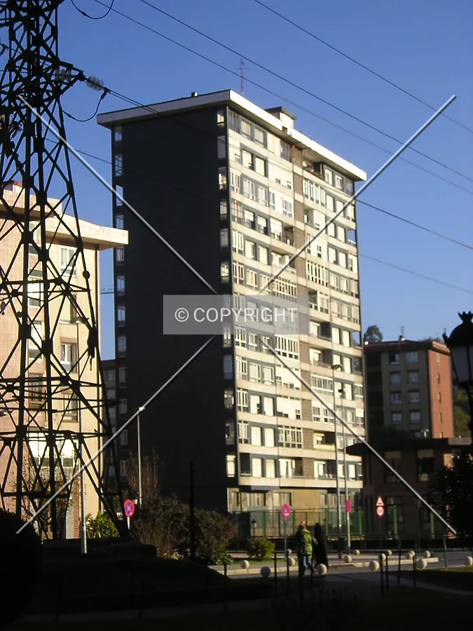 West facade from a nearby green zone
