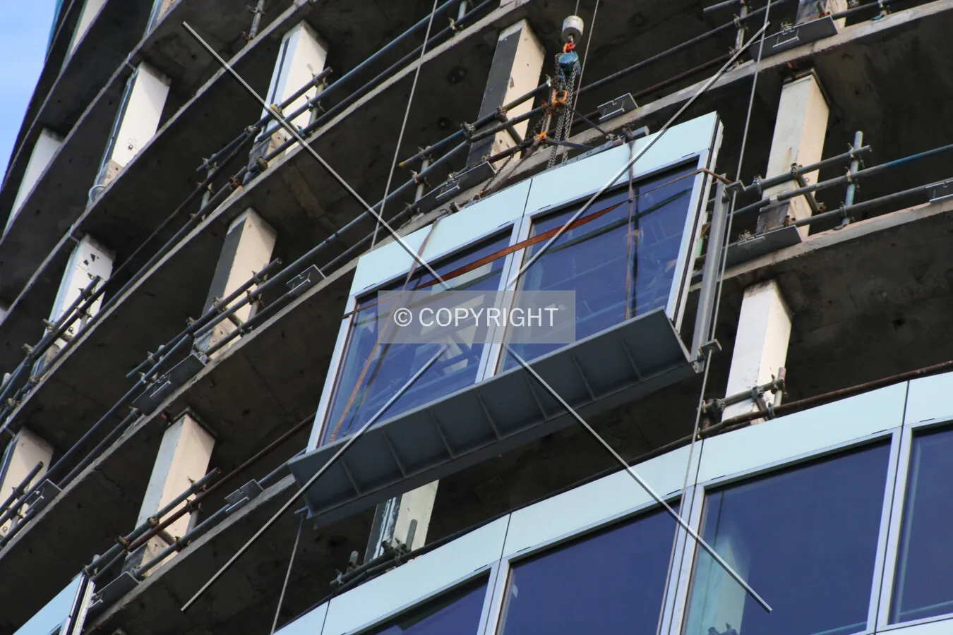Facade panel being lifted