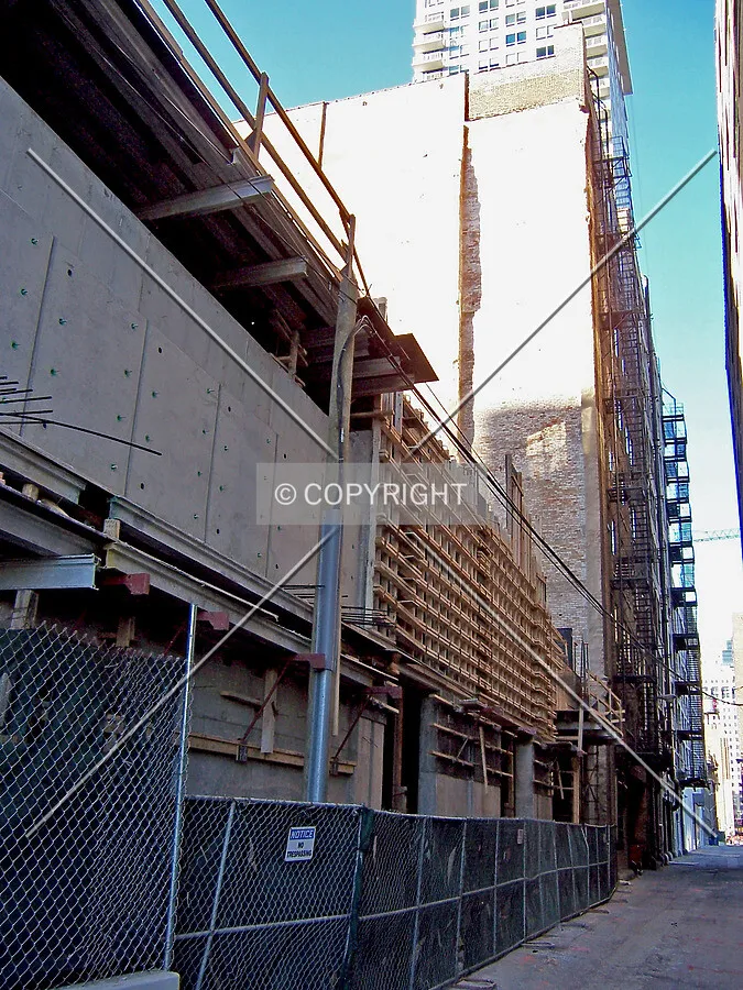 Concrete formwork along the alley on the east side of the site