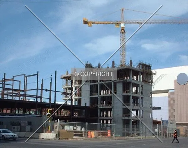 View to the Southwest from 6th Street, steel frame Entertainment Center rising to the left