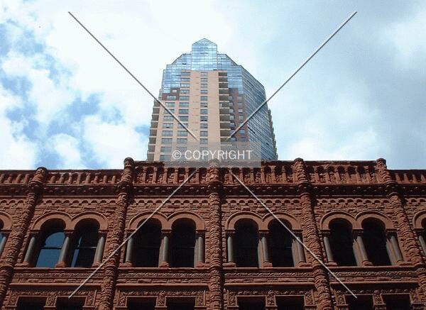 Jackson Tower looming over the Brooks Building, from 5th Street
