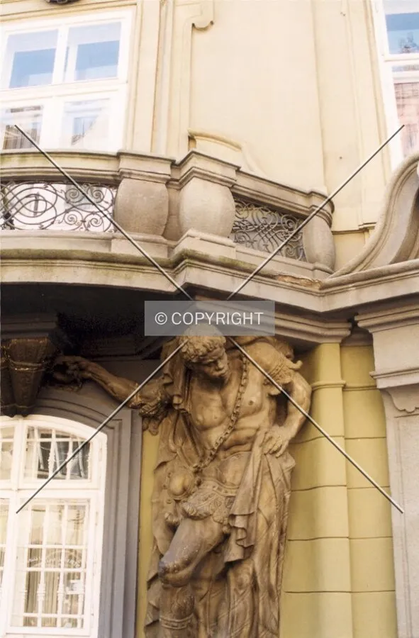 Elaborate statuary adorns a building