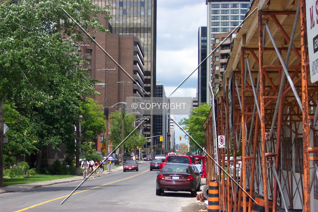 Looking down Queen Street, with a view of the scaffolding over the sidewalk