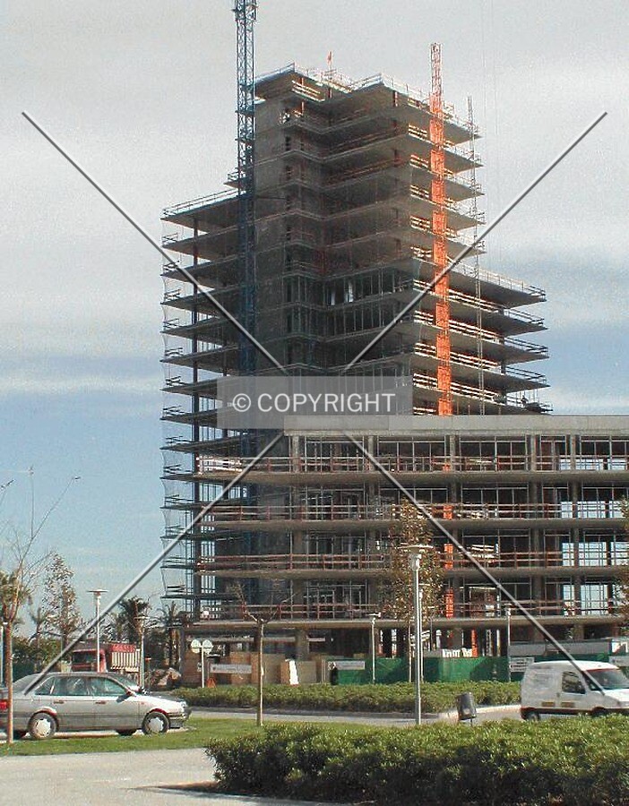 View of the back facade with the building topped out