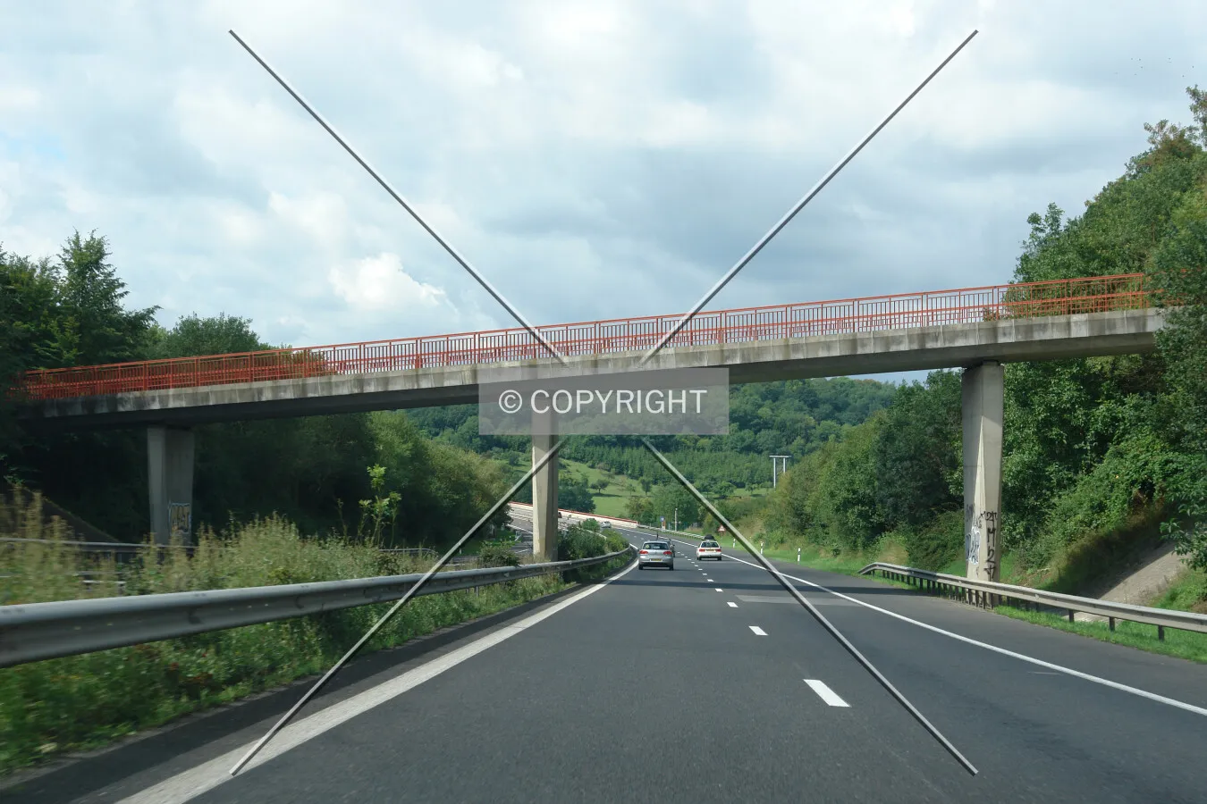 Sloping bridge over a highway