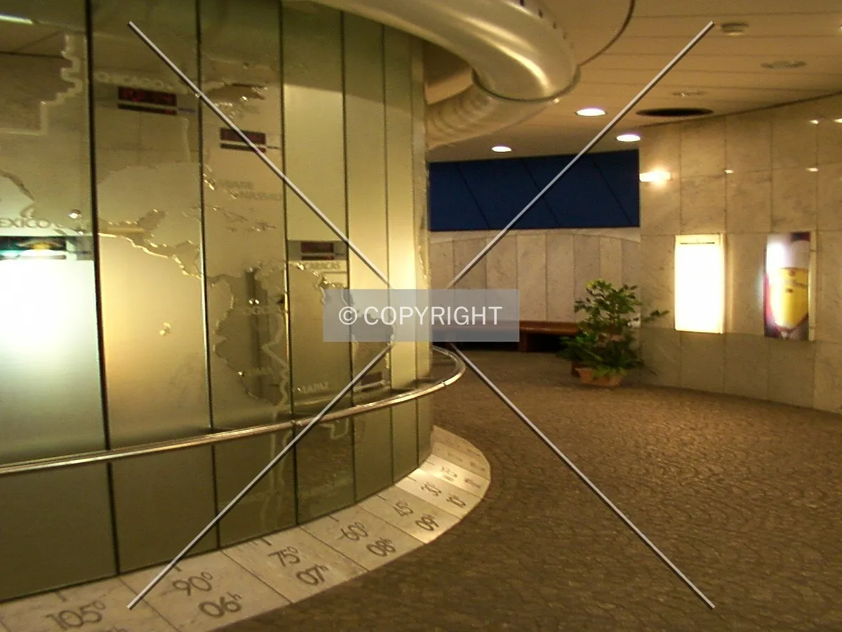 Inside the base, with the revolving map clock