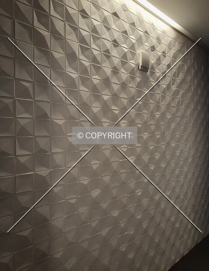Textured wall in the men's restroom; November 18, 2021