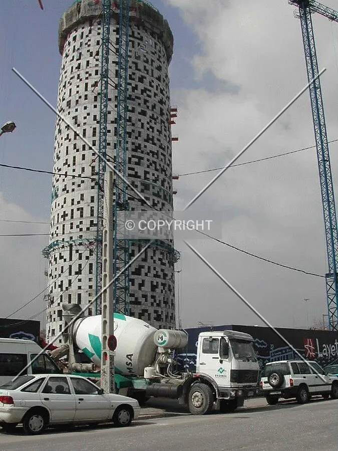View of the tower and a concrete lorry