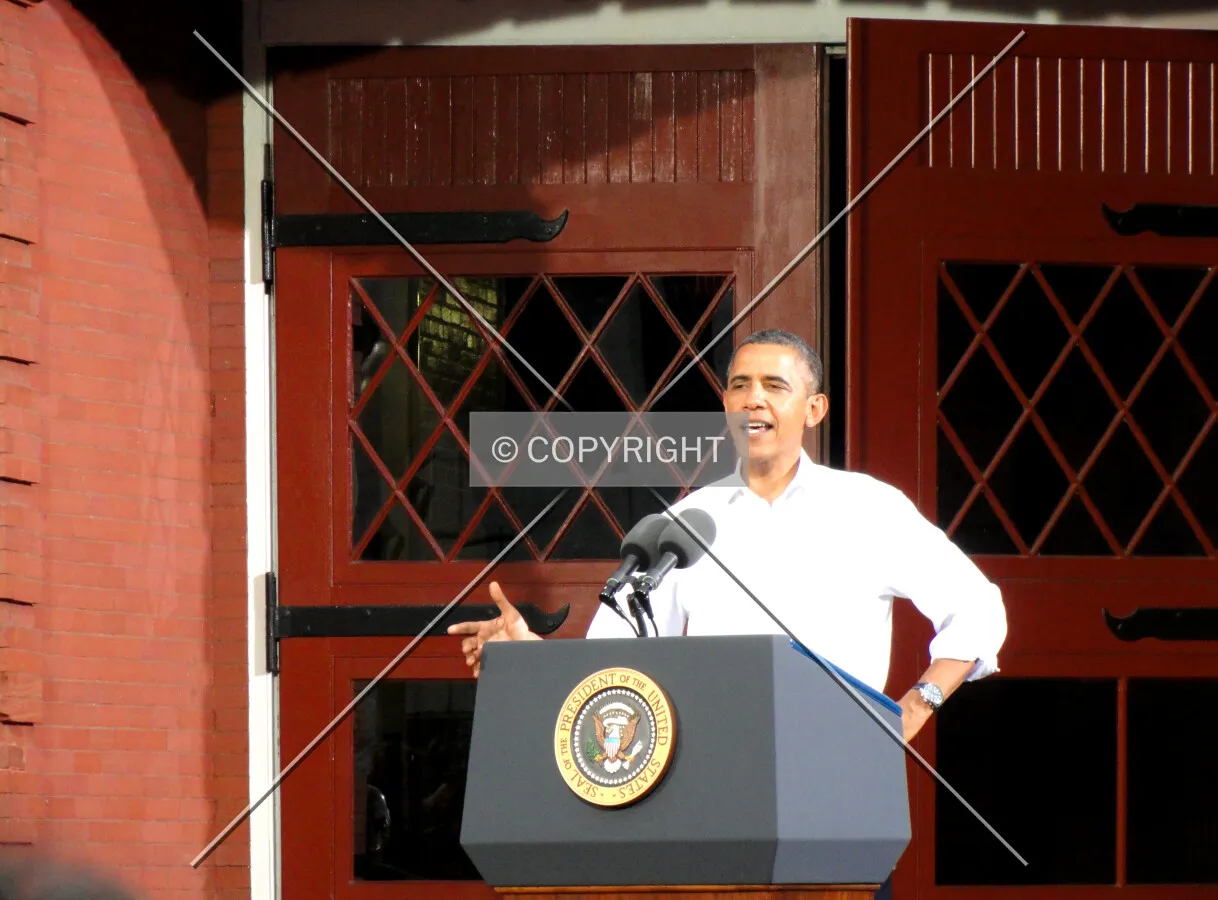 President Obama as he delivers a campaign speech in front of the main doors