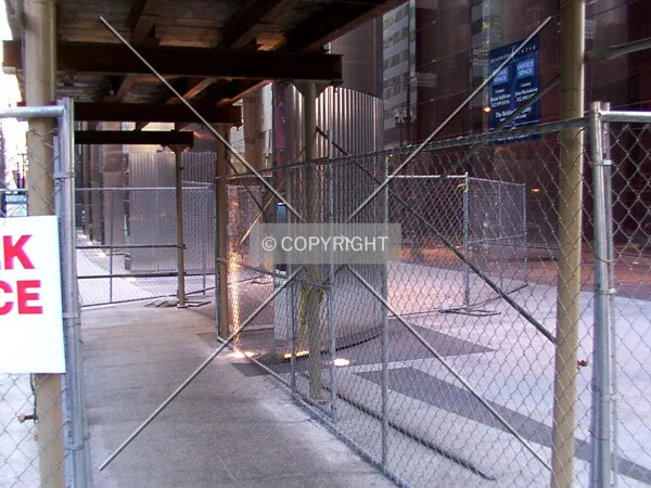 Construction canopy on Dearborn, during installation of the cornice