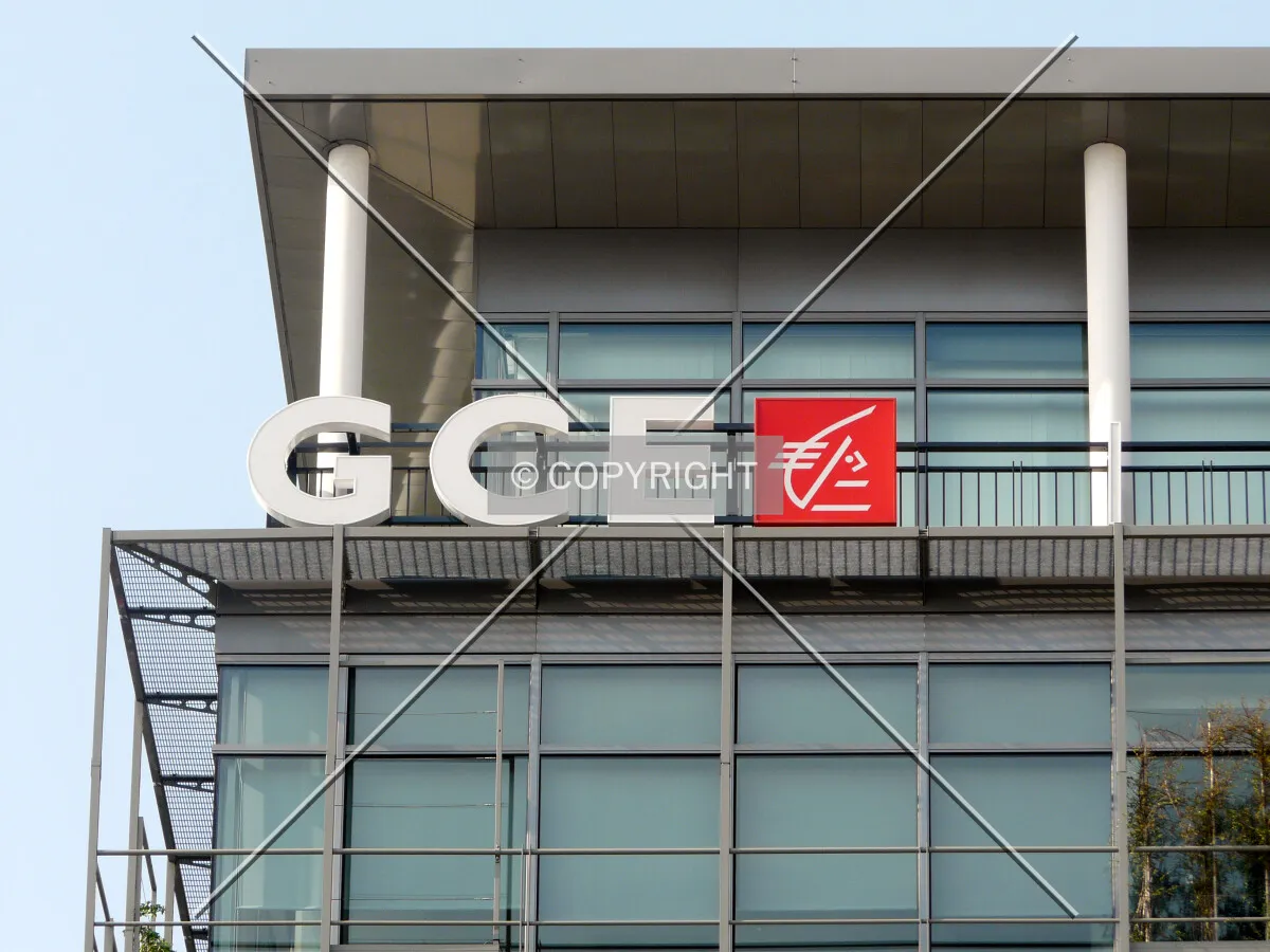 Company logo on top of the building