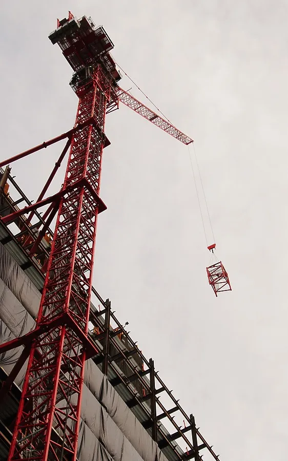 Tower crane and a section of frame