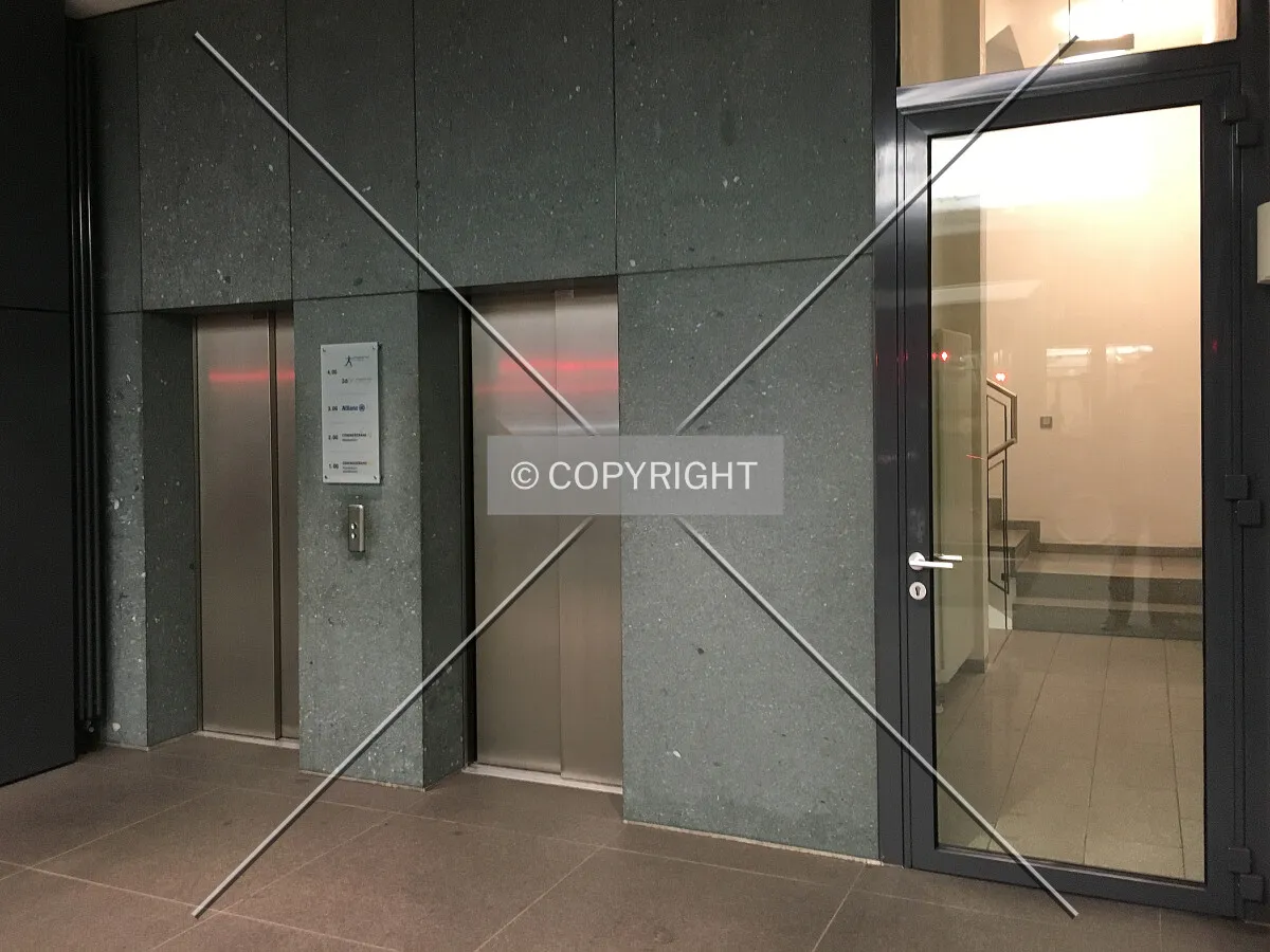 In front of the elevators