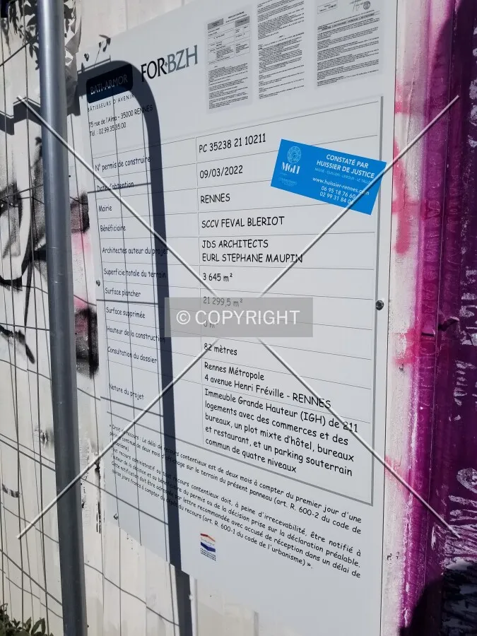The building permit.