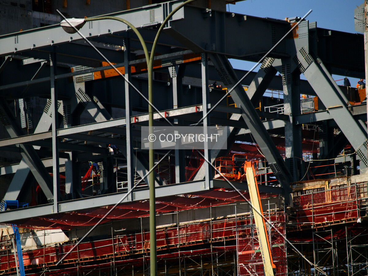 Metal structure hanging between the two shafts