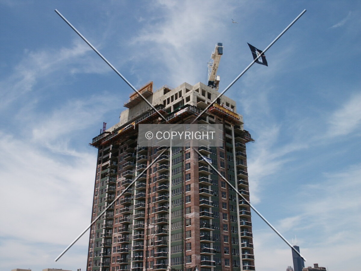 Airplane flying over the tower with a banner