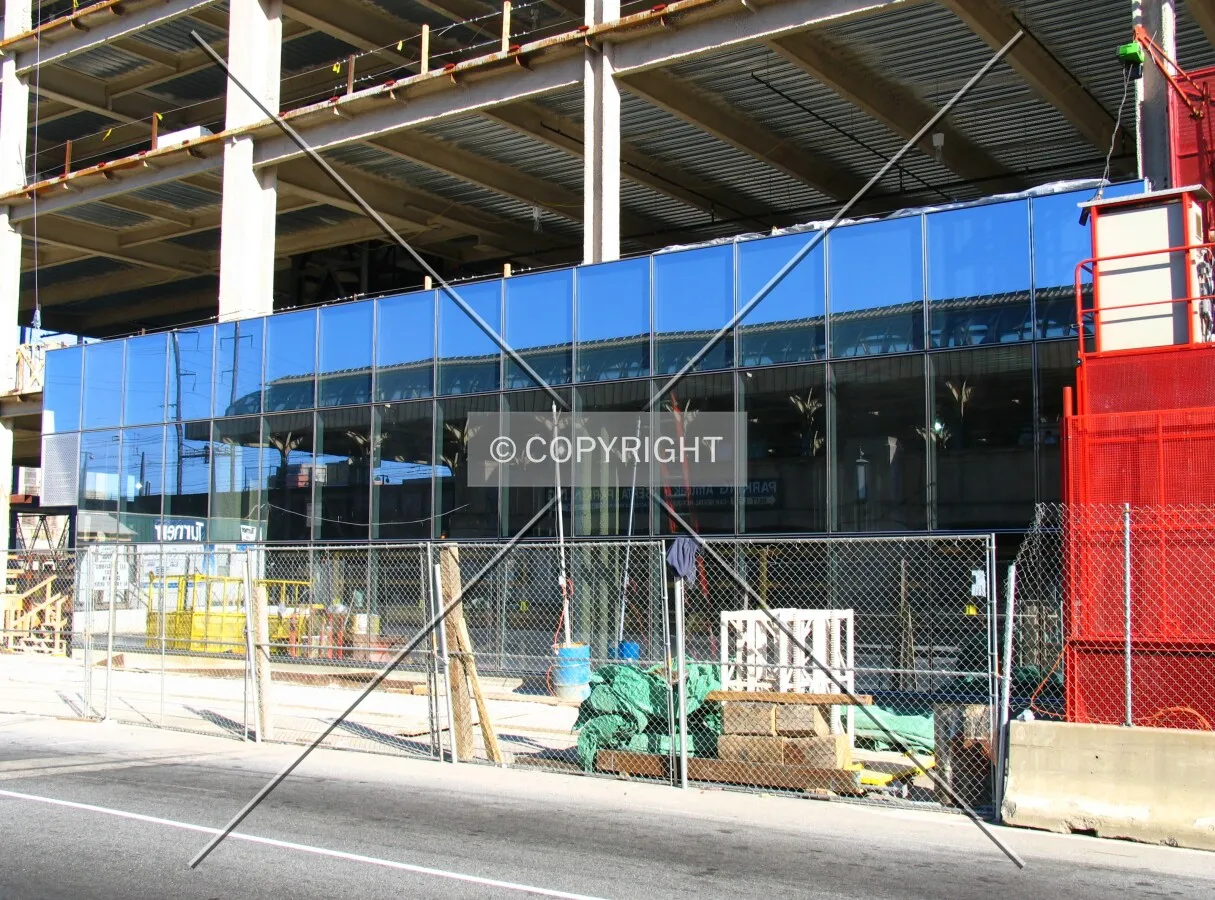 First pieces of the facade are installed on the south side