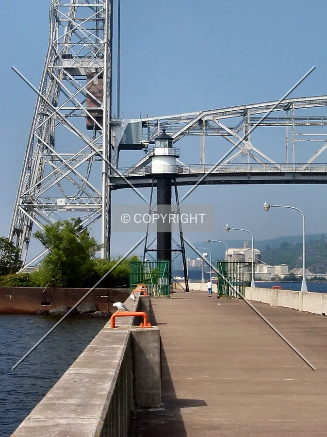 View to the west from the South Breakwater of the Duluth Ship Canal, framed by the Aerial Lift Bridge