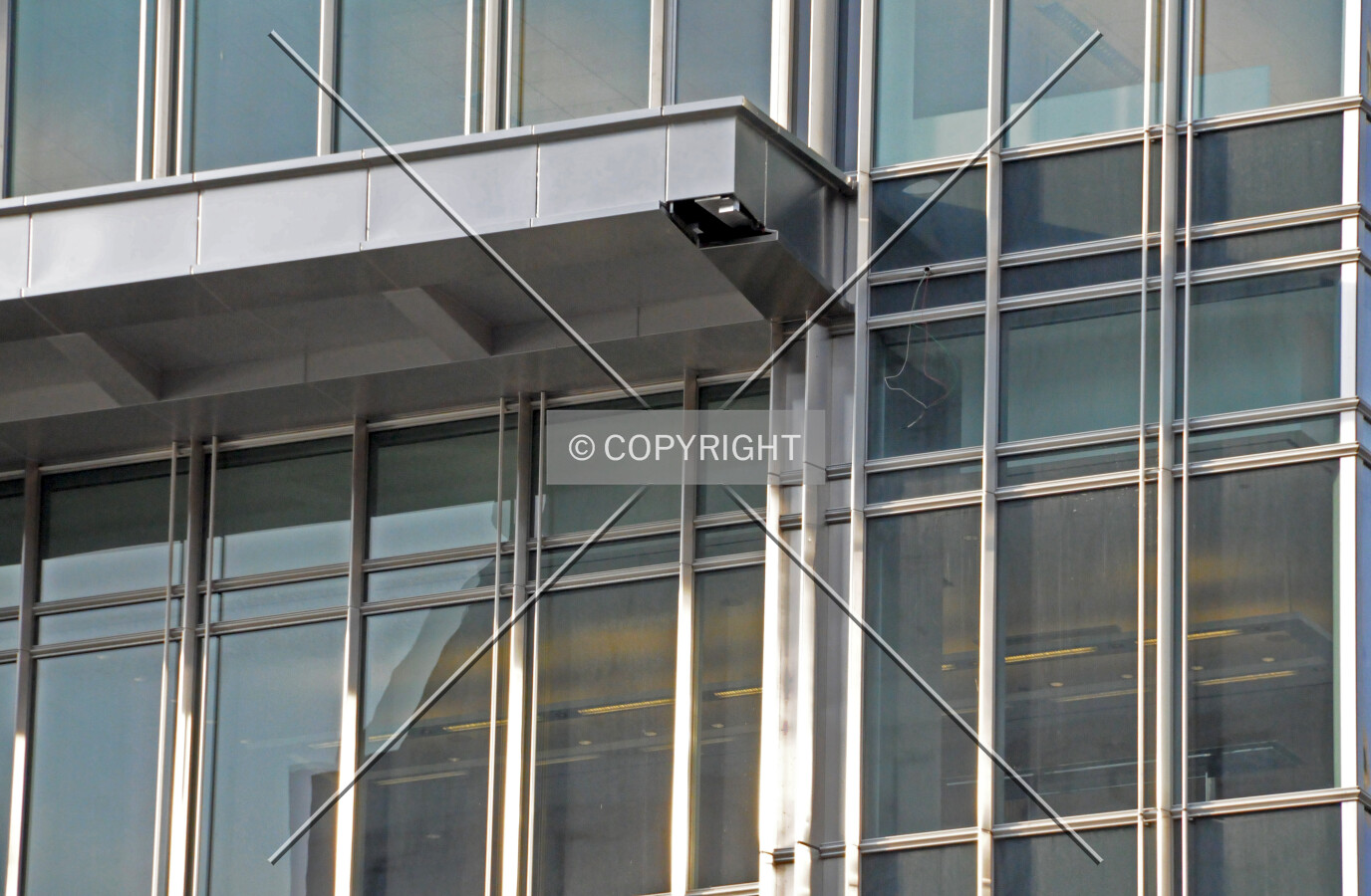Missing stainless steel facade panel at the east end of the riverfront balcony