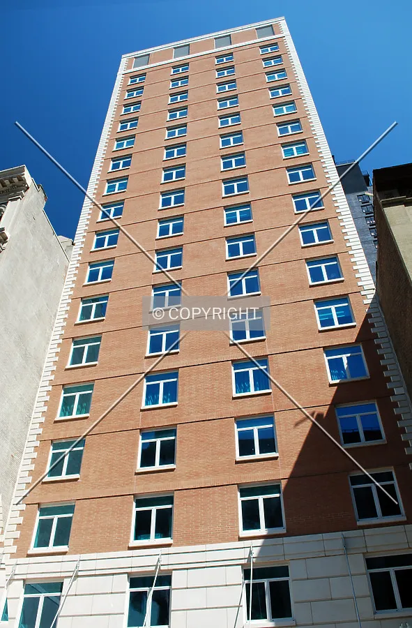 Looking up from West 28th Street
