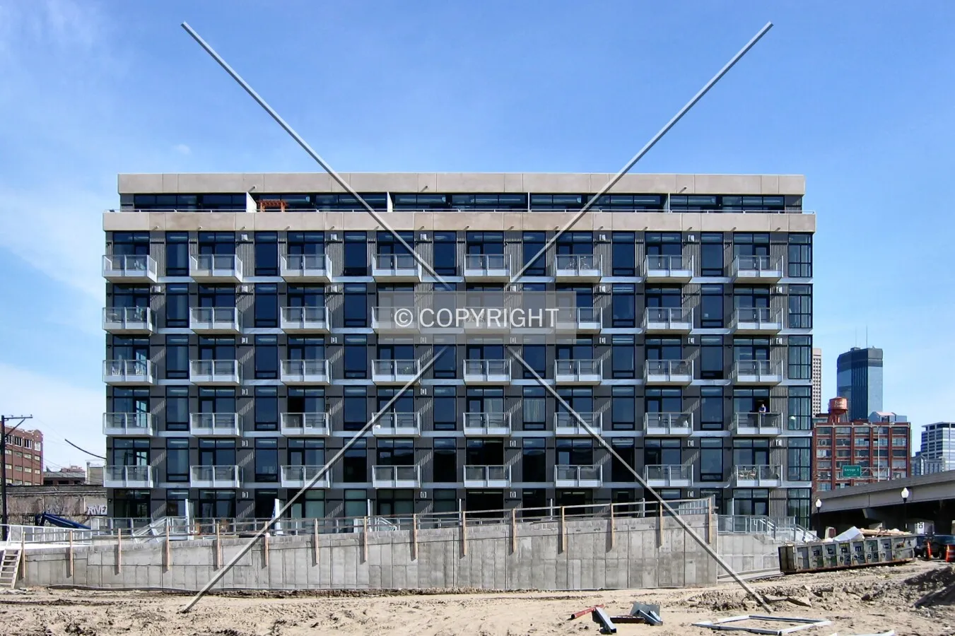 Full northwest elevation, over the site to soon be occupied by 730 Lofts