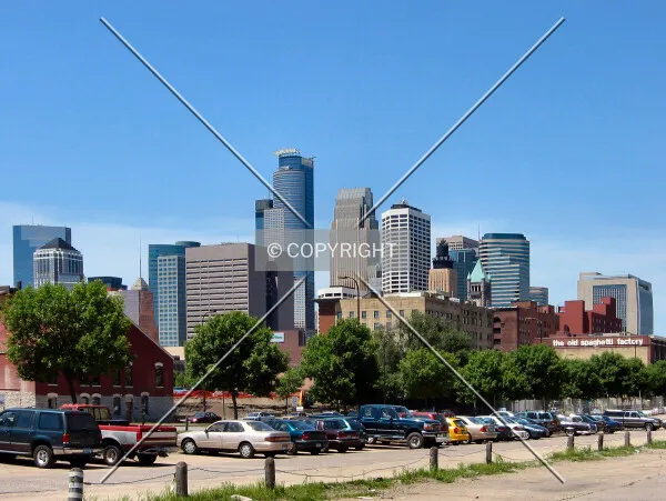 Partial skyline view from former railyards, now parking lots along Washington Avenue South