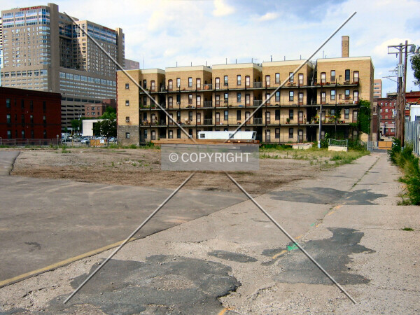 Fenced-off site from 10th Street