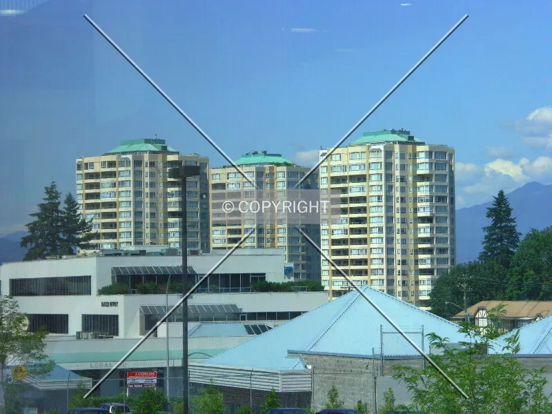 Fraser Valley's largest apartment complex through the windows of the Real Canadian Superstore