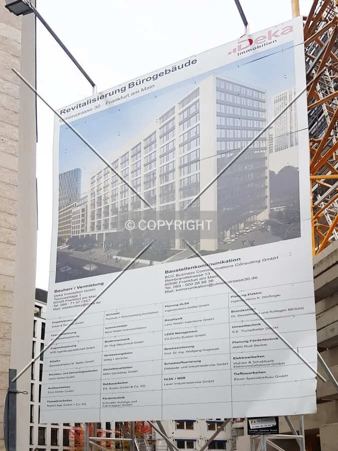 The construction sign showing involved companies
