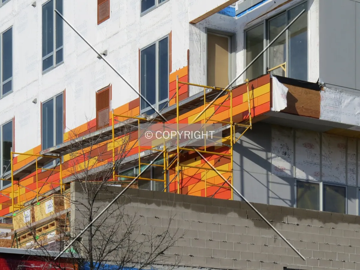Colorful facade panels, partially installed