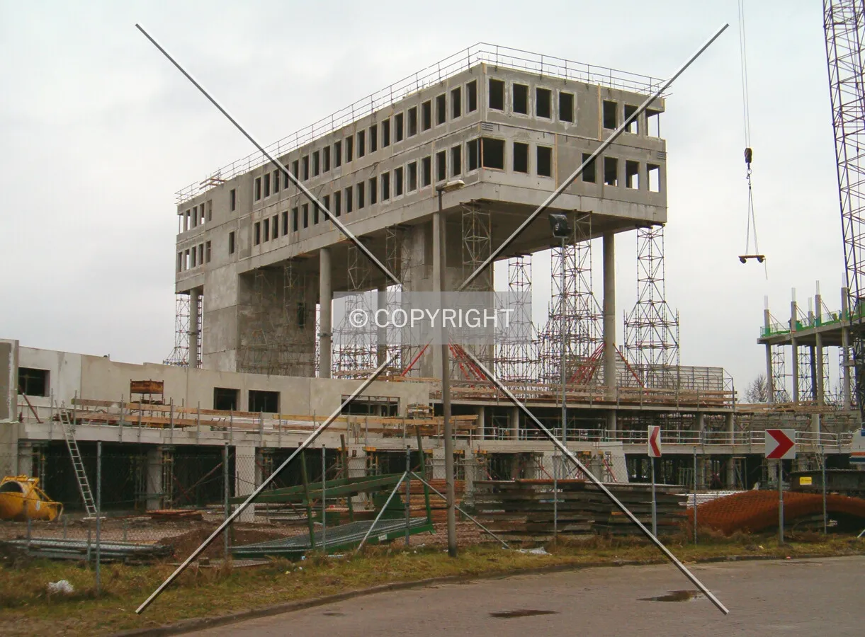 Construction of the smaller building of the complex as seen from the northeast
