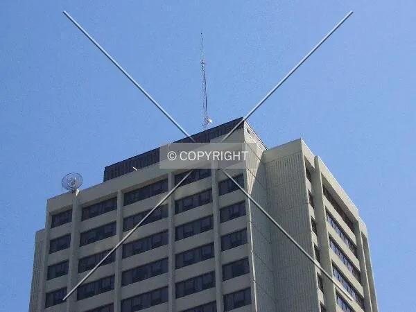 Communications equipment adorning the top of the tower