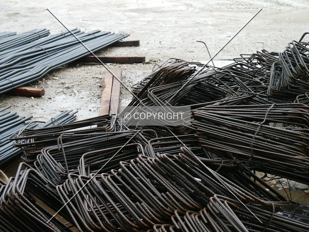 Piles of rebars near the east fence