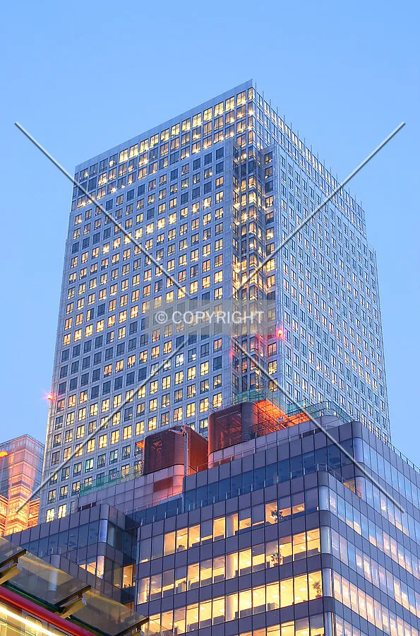 Looking up from West India Quay at dusk