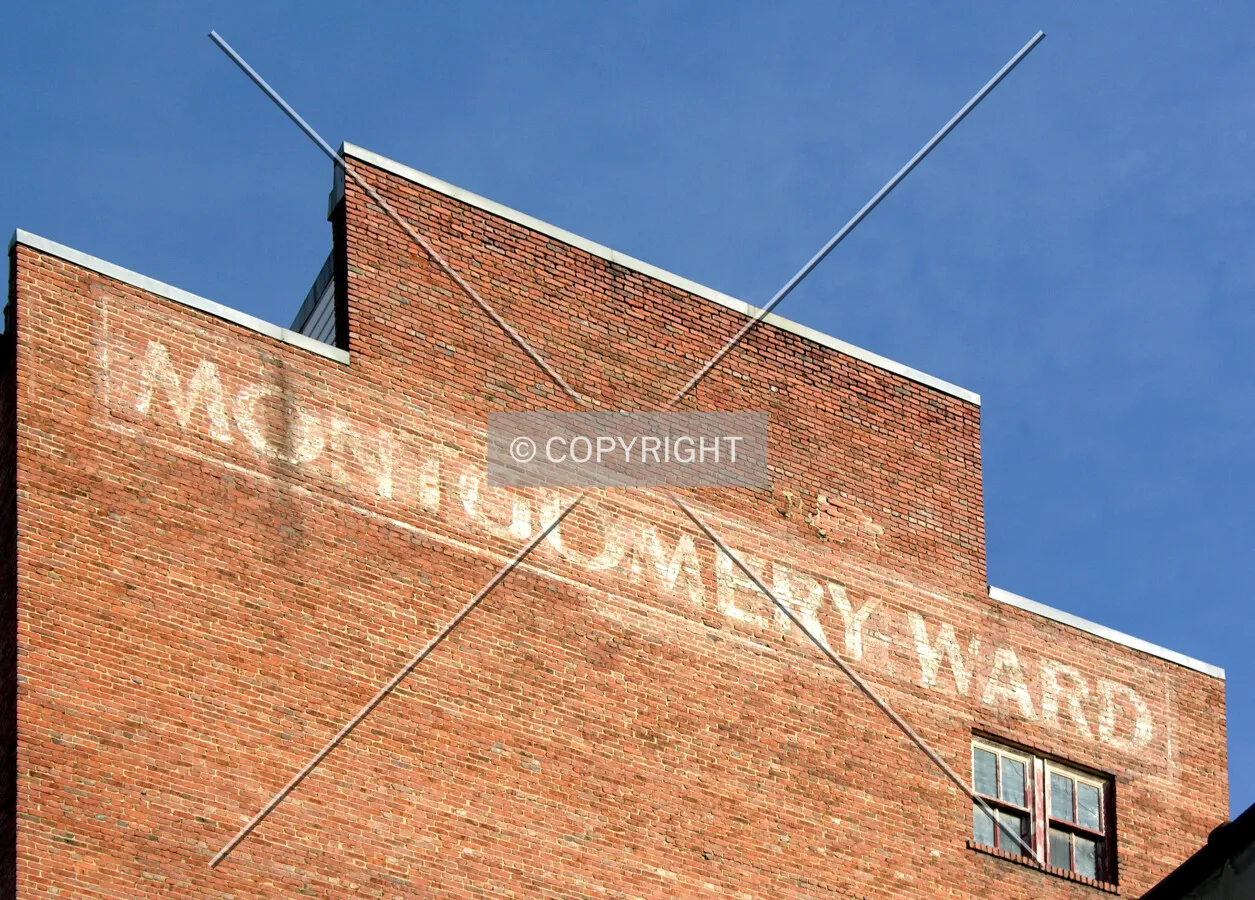 Faded Montgomery Ward signage on the western side